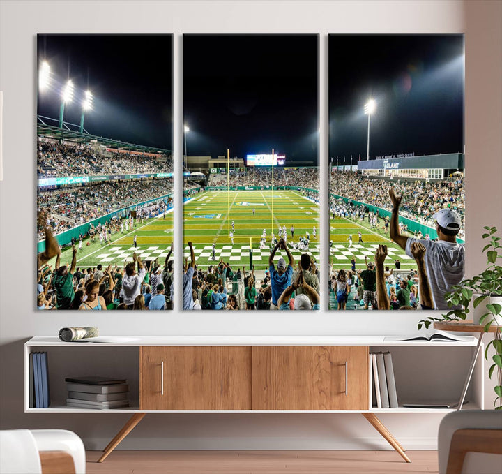 This vibrant wall art canvas print captures the excitement of fans cheering for the Tulane Green Wave Football Team under the lights of Yulman Stadium.