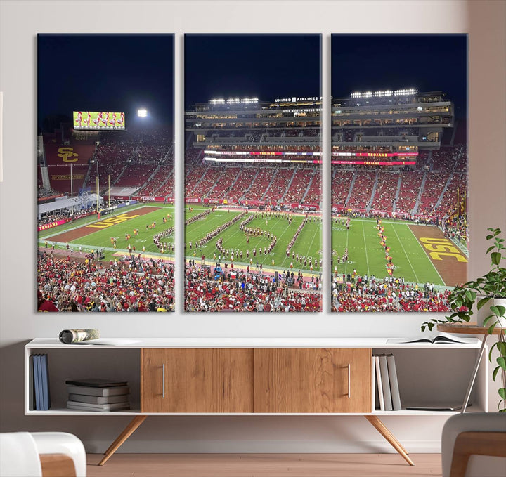 Canvas print depicting a packed stadium at night with a marching band forming USC, celebrating the Trojans at Los Angeles Memorial Coliseum.