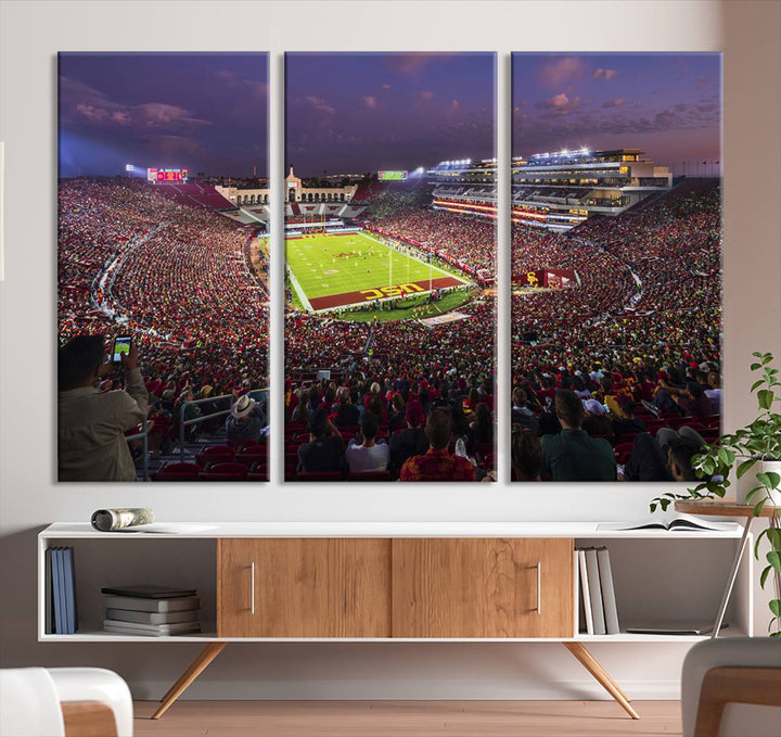 The vibrant wall art canvas print captures the USC Trojans playing under lights at dusk in LA Memorial Coliseum.