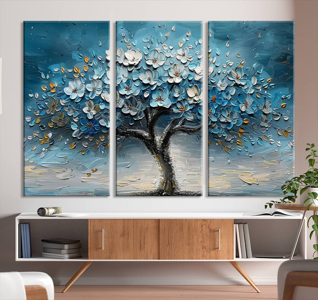 Abstract Blooming Tree Wall Art Print features blue, white, and gold textures on museum-quality canvas, perfect for modern decor.