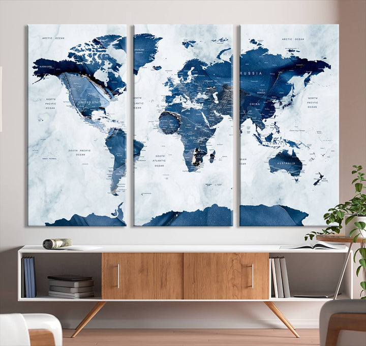 Navy Blue World Map with Antarctica Canvas: A perfect abstract home decor piece featuring a grunge-stained background.