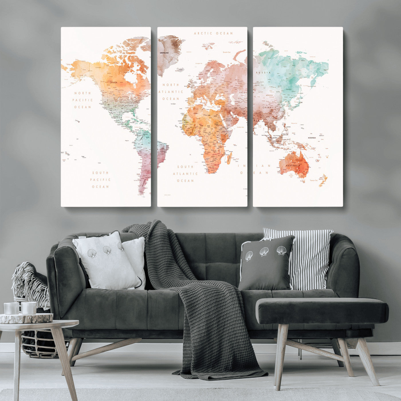 Watercolor world map featuring soft pastel hues in orange, green, blue, and purple on a light background, printed on canvas for vibrant and artistic wall decor.