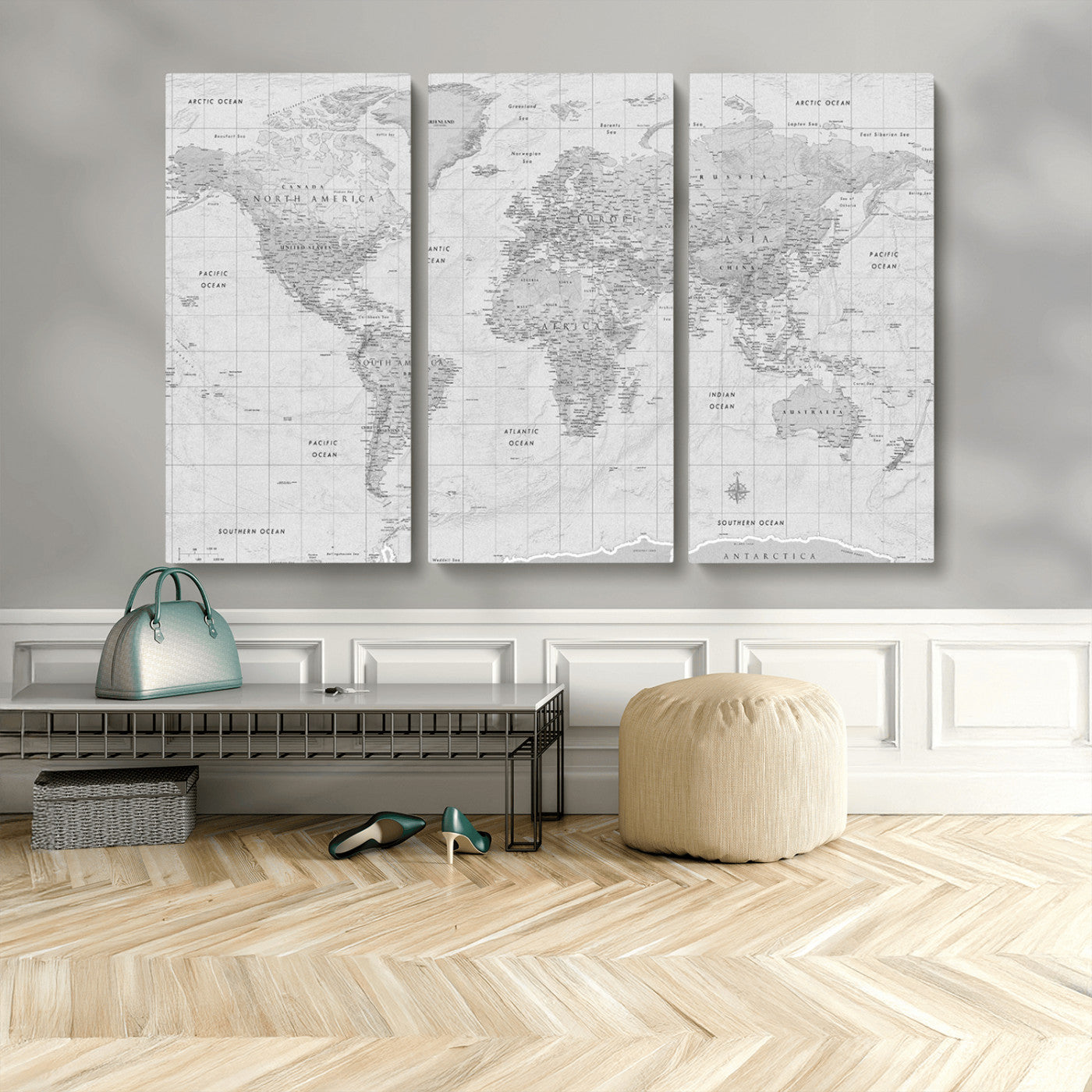 Grayscale vintage world map with detailed country borders, oceans, continents, and major cities on a textured parchment background.