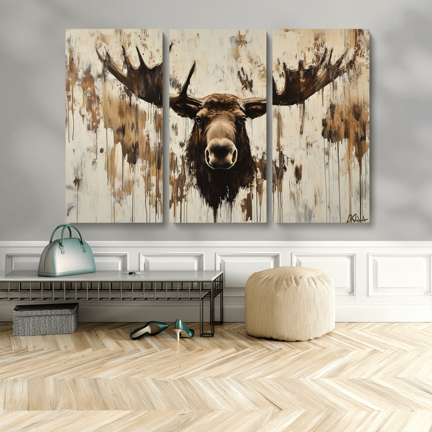 Expressive painting of a moose head with wide antlers in dark brown and beige tones, featuring paint drips and splatters on a light textured background, creating a striking rustic wall art canvas.