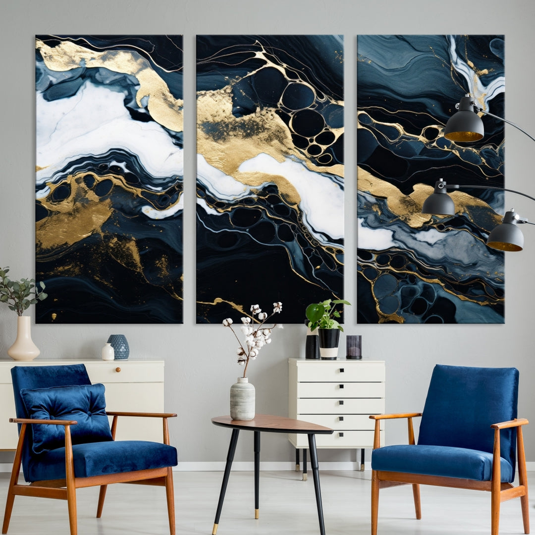 Fluid Marble Abstract Wall Art Print, a contemporary piece with black, white, and gold swirls on museum-quality canvas.