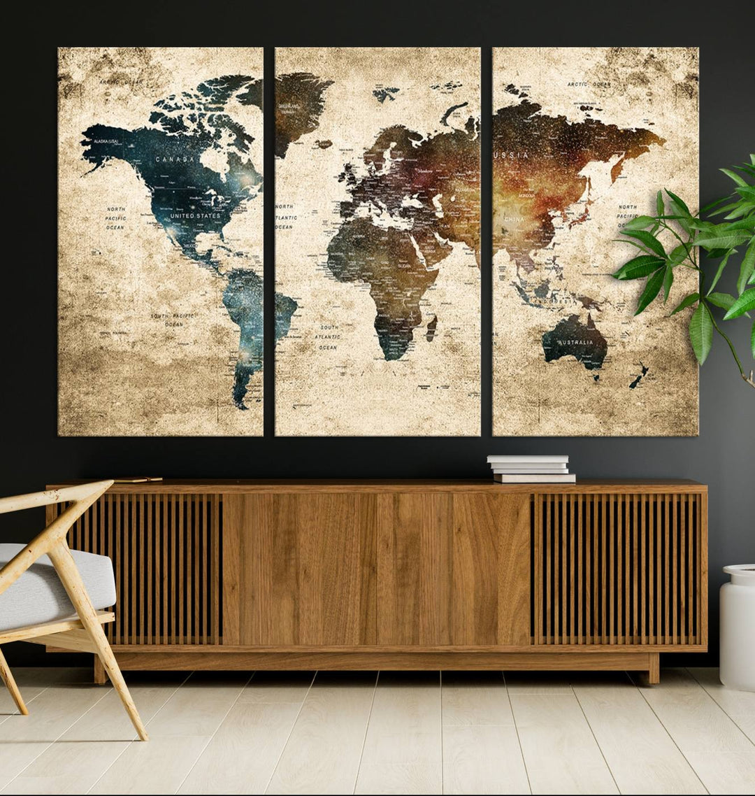 Vintage World Map Canvas Wall Art, perfect for antique-style decor, displayed against a light wood wall.