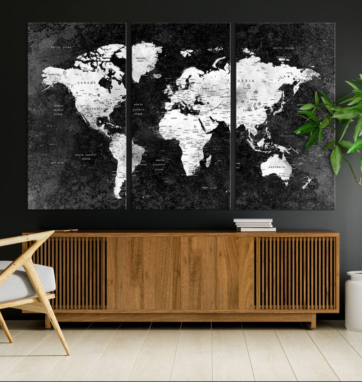 The dining room features a Modern Grayscale World Map 3-Panel Canvas Art as its focal point.