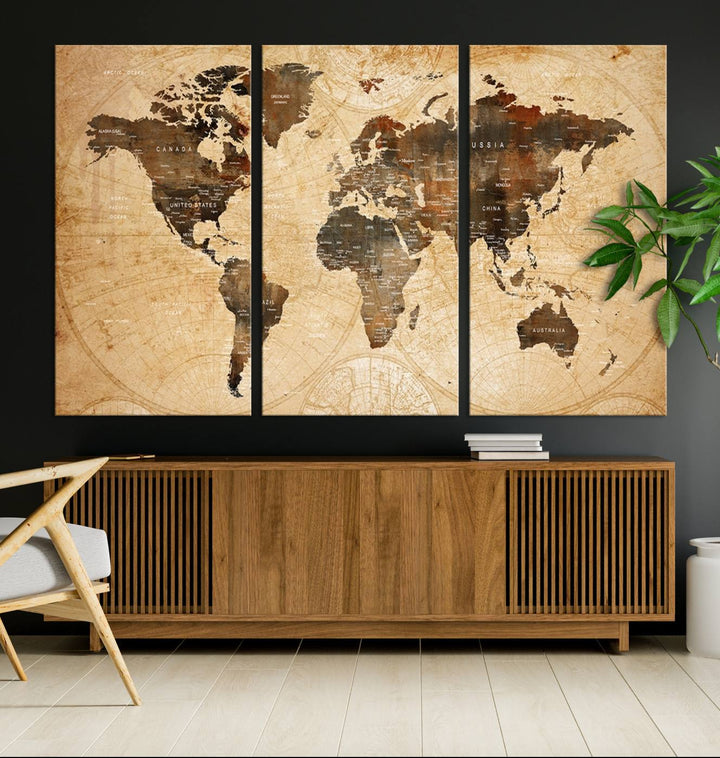 Vintage World Map: 3-Panel Canvas Print in antique rustic style. Framed and gallery wrapped. Ideal for decor.