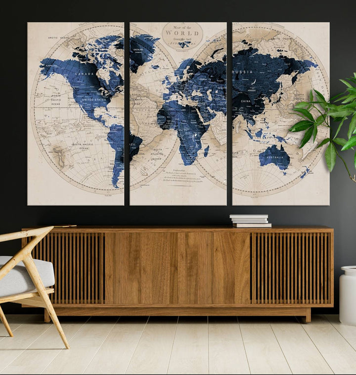 The Vintage Triptych Map Print is a grunge-stained blue and beige world map, perfect for enhancing wall decor.