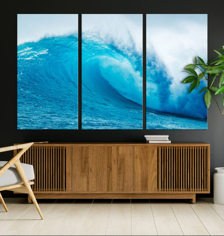 A museum-quality canvas depicting a vibrant blue ocean wave with white foam under a clear sky.