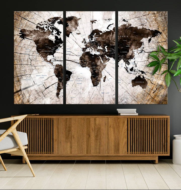 The Tree Ring World Map Canvas hangs above the table, blending into the nature-inspired setting.