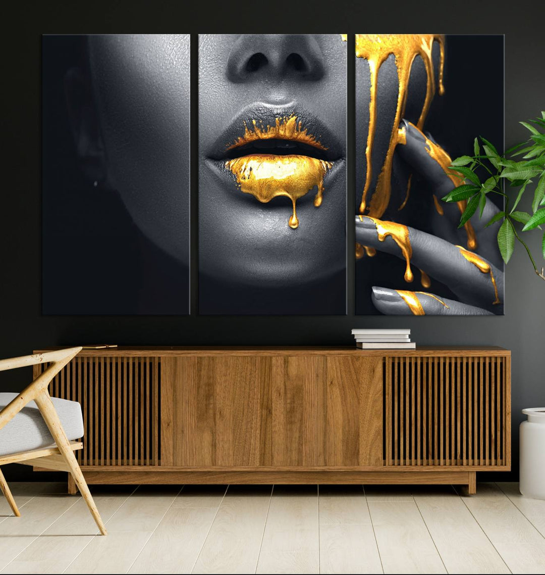 The Gold Lips and Black Woman Makeup Canvas Print features a chic monochrome face design, making it ideal for a modern dining room.