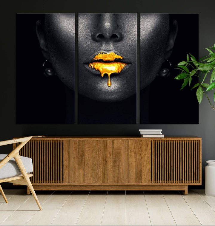 The Honey Gold Lips and Black Woman Photograph canvas print adds a striking touch to the room.