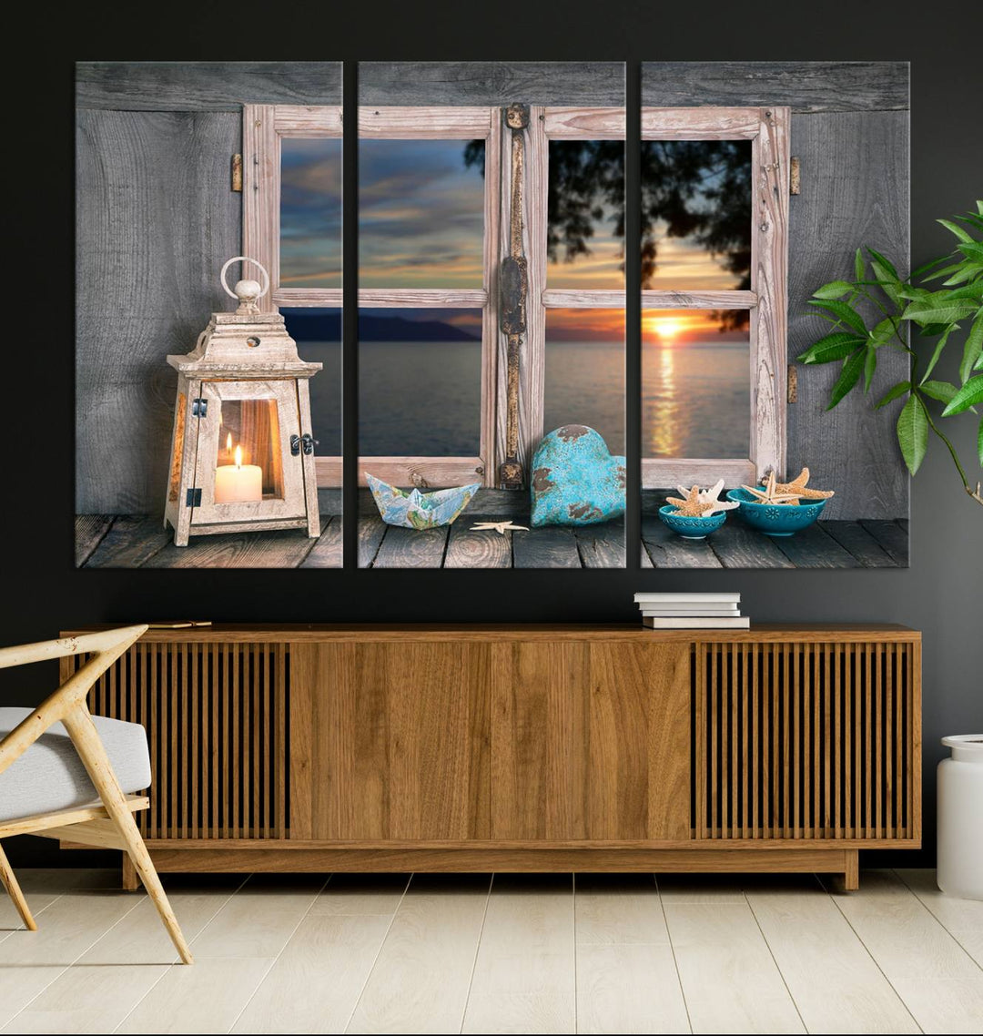 The Astonishing Sunset from the Window canvas print beautifully captures a sea view, accompanied by a lantern and starfish.