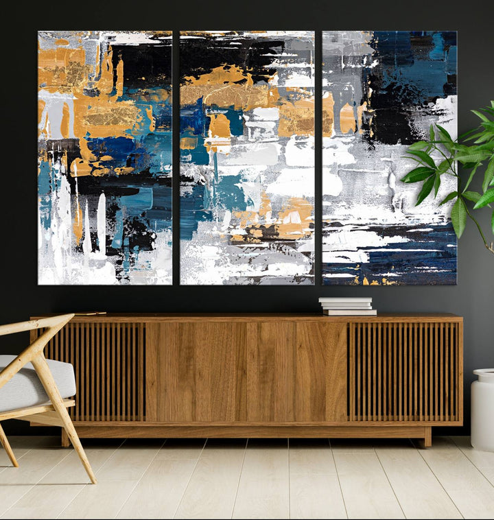 Blue and Gold Abstract Canvas Wall Art hangs prominently.