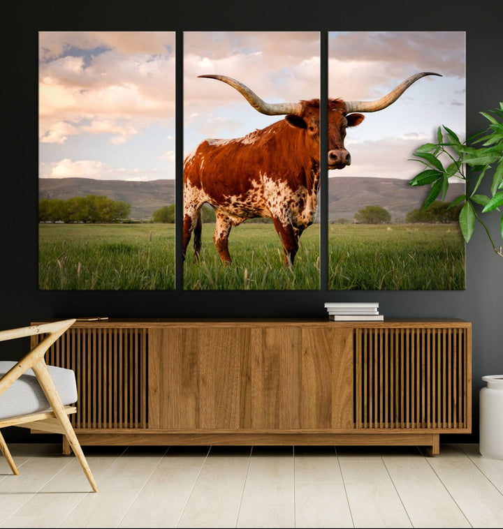 The Texas Cow Canvas Wall Art print captures a longhorn cow at sunset and is ready to hang.