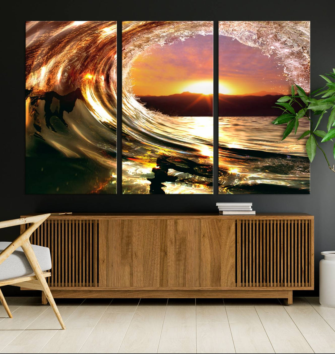 The Golden Wave Sunset Triptych Canvas Art showcases an ocean wave at sunset, casting warm light.