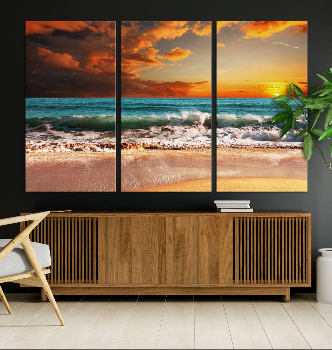 A Golden Sunset Beach triptych seascape canvas hangs on the wall.