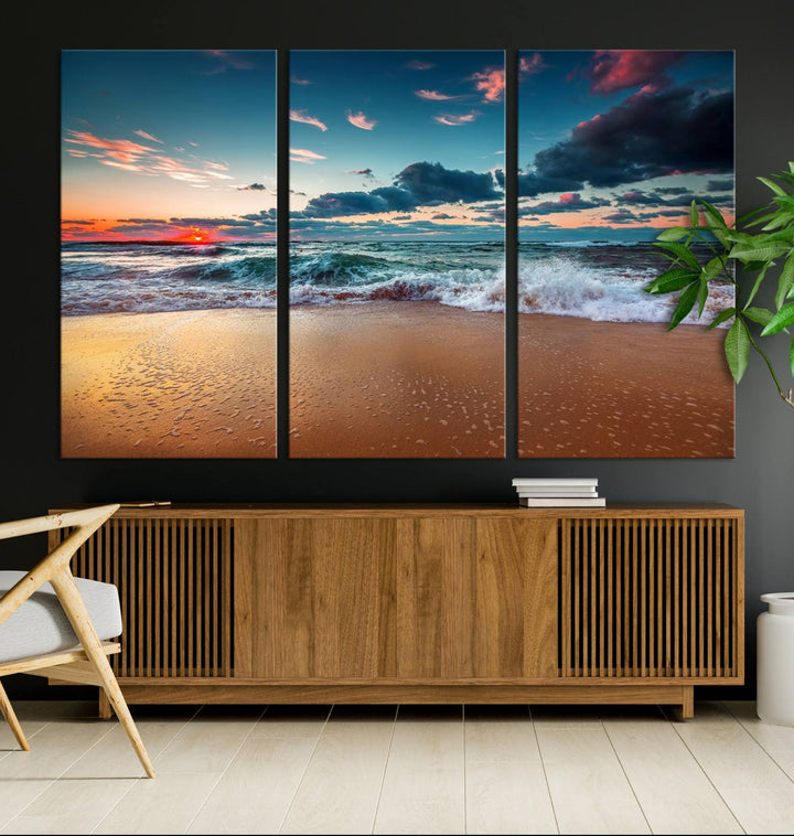 A large 3-panel sunset ocean beach canvas is displayed above the counter.