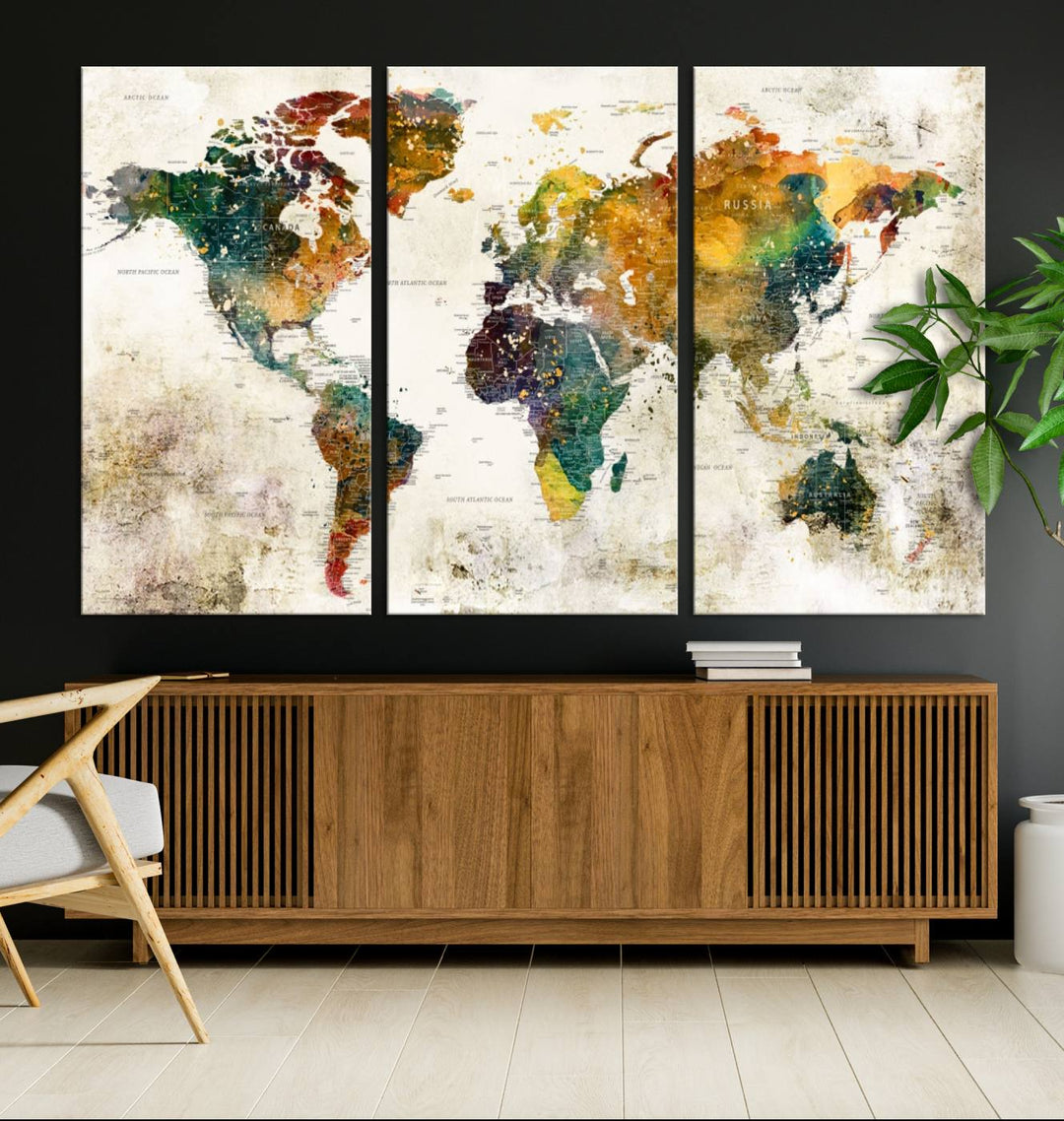 A 3-panel vintage world map canvas art is displayed.