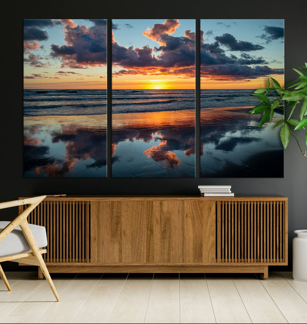 A Beach Sunset Print - Stunning Ocean Canvas Artwork adorns the wall.