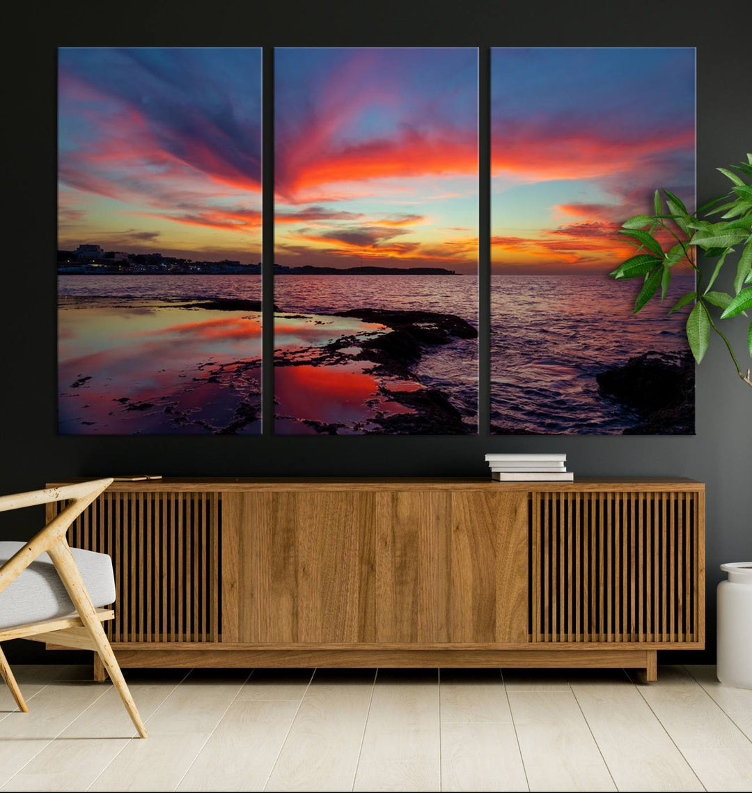 The Glorious Sunset on The Beach canvas print adorns the dining room.