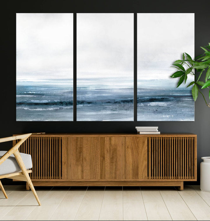 The dining area features Blue Ocean Abstract Artwork on canvas.