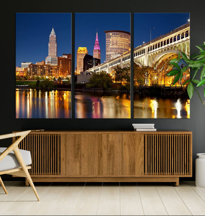 The Cleveland City Lights Canvas showcases a lit-up bridge and cityscape at night.