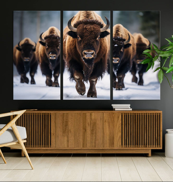 The dining room features an American Bison Herd Canvas Print against the snow.