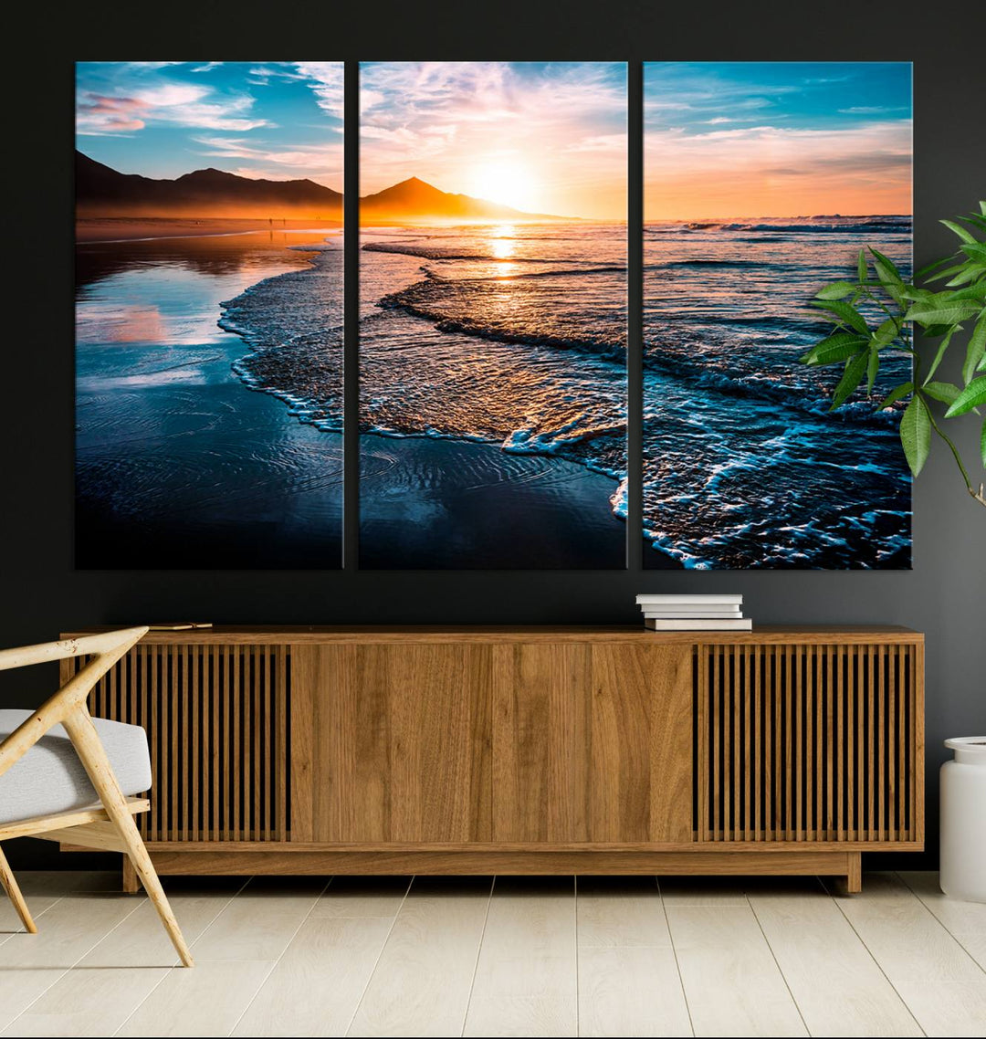 The Sunset Beach Ocean Canvas Wall Art – Tranquil Reflections at Dusk enhances the ambiance with its captivating depiction of serene ocean views at dusk.