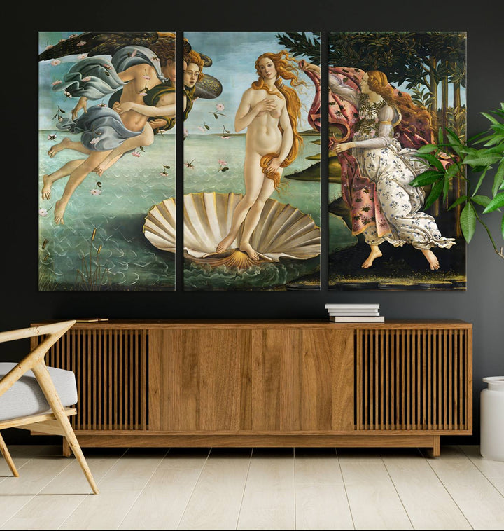 A canvas print of Botticellis The Birth of Venus is displayed on the wall.