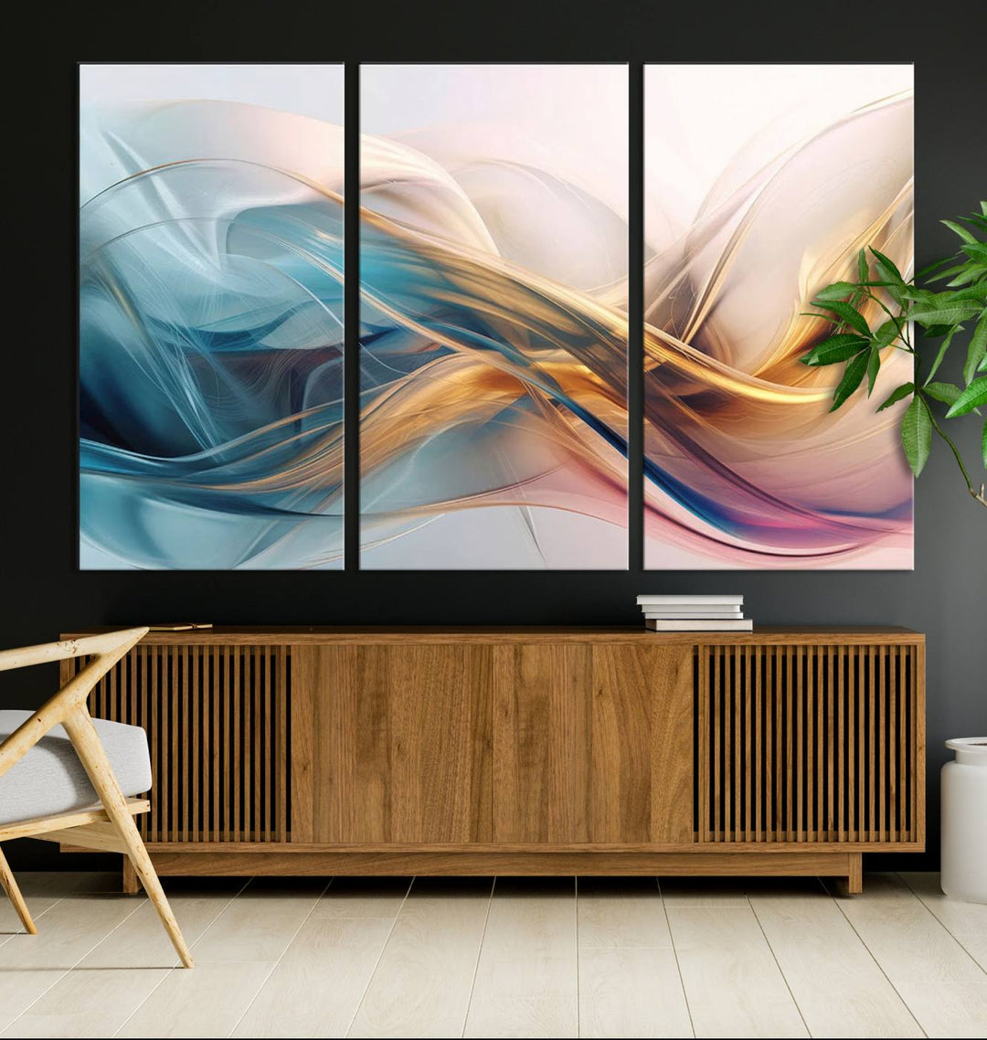 Abstract Flowing Colors Wall Art featuring blue, gold, and pink adds modern elegance to the space.