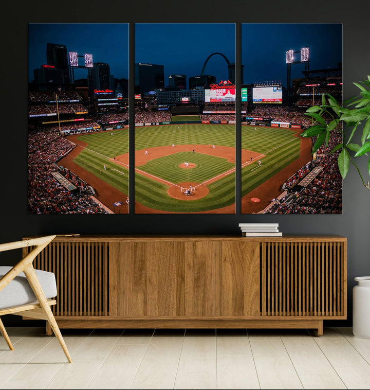 A St. Louis Cardinals Baseball Team print of Busch Stadium at night adorns the wall.