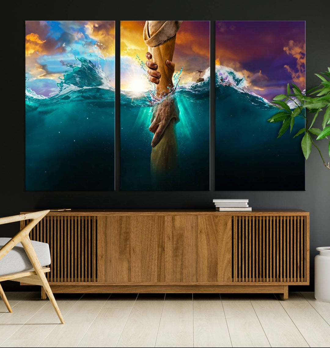 The God Hand Wall Art Canvas Print depicts hands reaching through water against a vibrant sky.