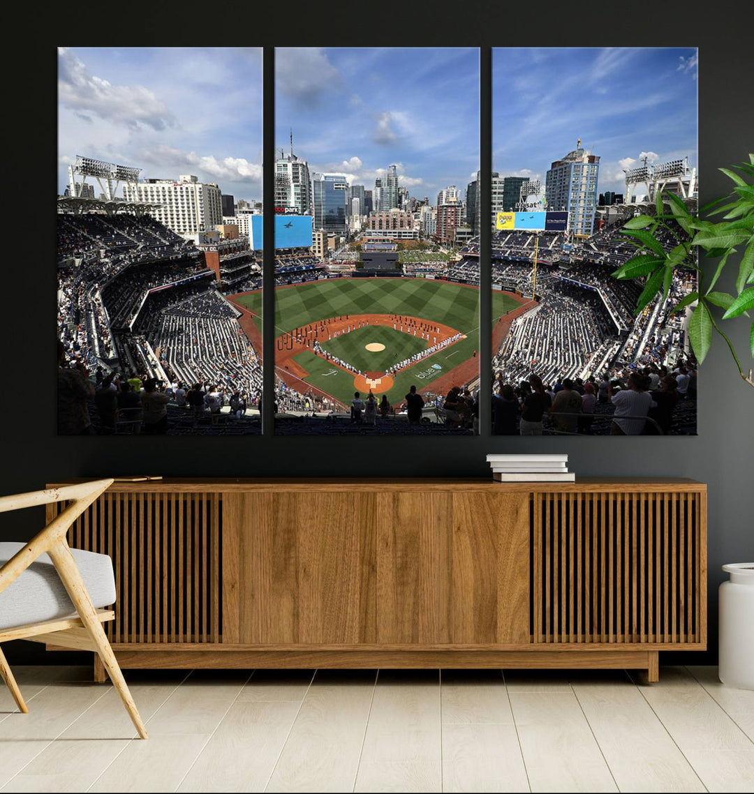 The San Diego Padres Baseball Canvas Print of Petco Park enhances the modern kitchen-dining area.