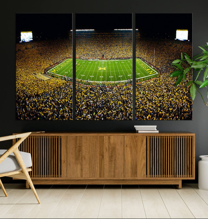 Aerial view of Michigan Stadium night game, ideal for Michigan Wolverines Football Team displayed on a triple canvas wall art.