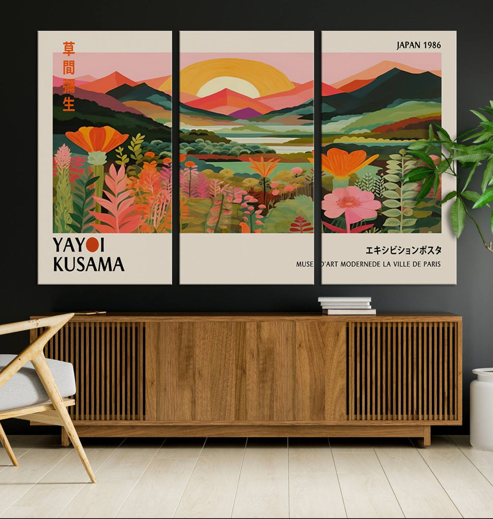 The Yayoi Kusama Landscape Canvas Print, featuring vibrant floral mountains and sunset scenery, enhances the room.