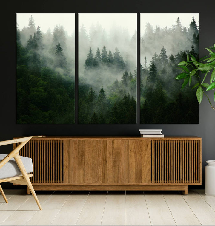 The Misty Forest Wall Art Canvas Print captures a serene, foggy evergreen landscape, evoking a mysterious woodland ambiance.