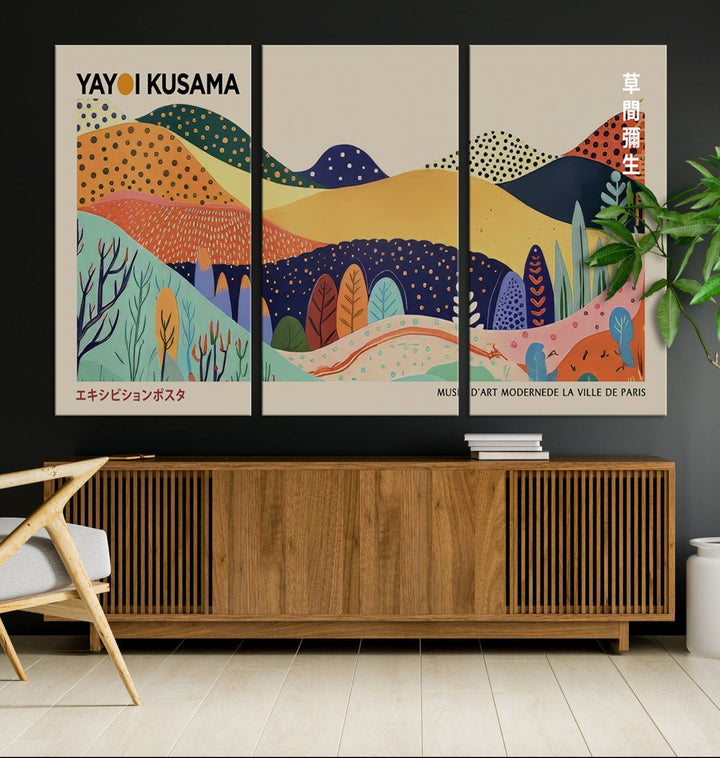 In a living room with contemporary décor, a vibrant abstract landscape by Yayoi Kusama from 1986 is prominently displayed.