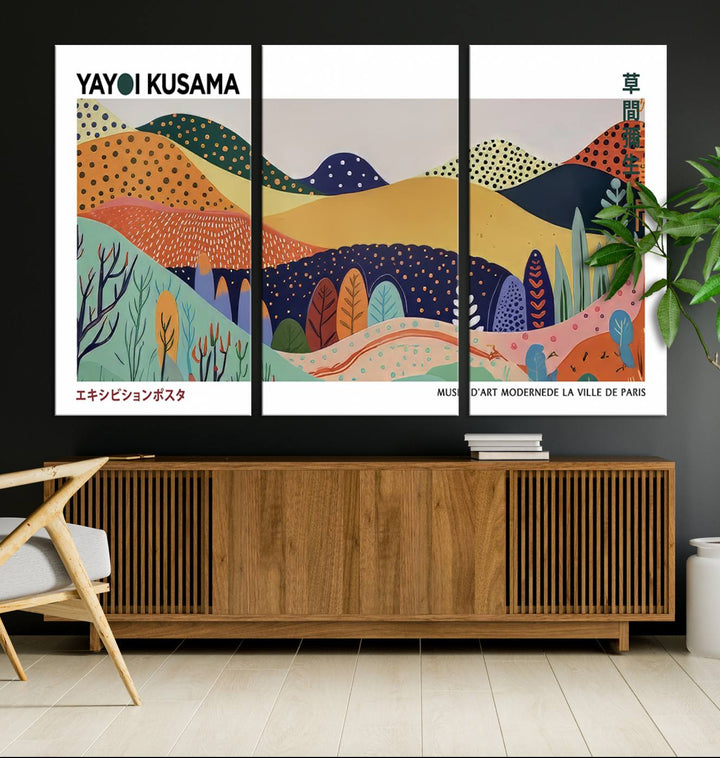 A triptych featuring the Framed Yayoi Kusama 1986 Wall Art Print hangs above. This Japanese Wabi Sabi inspired piece, rich in vibrant abstract landscapes, adds an elegant touch to any nature-inspired décor.