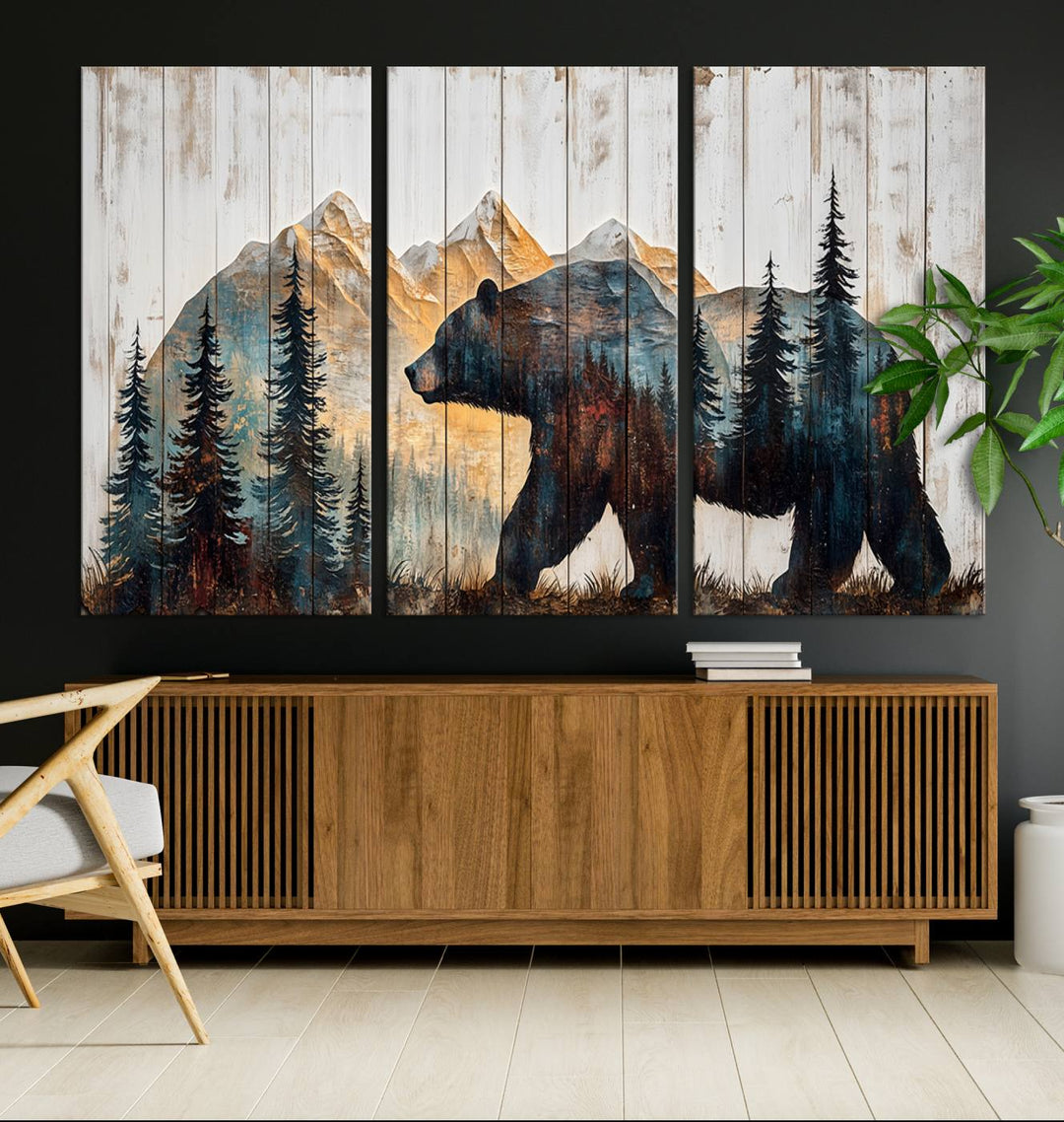 The Grizzly 399 Bear Wall Art showcases a rustic bear silhouette against mountain and tree scenery on a wooden backdrop, making it an ideal addition to cabin decor. This nature-themed artwork gracefully enhances charm in any setting.