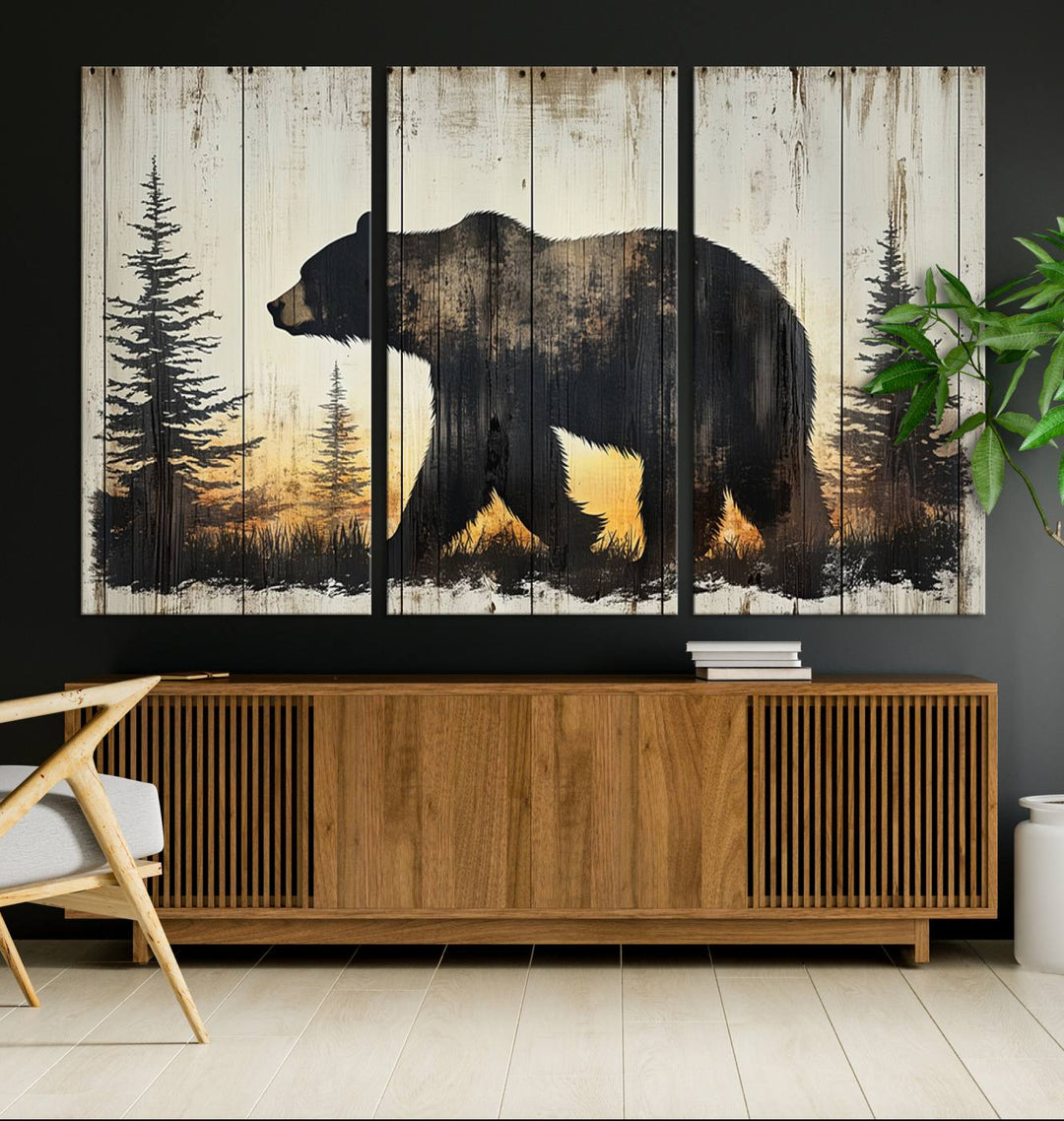 The Vintage Grizzly 399 Bear Wall Art, featuring a striking forest silhouette on mountain wood canvas, adds rustic charm above a wooden console amidst farmhouse decor.