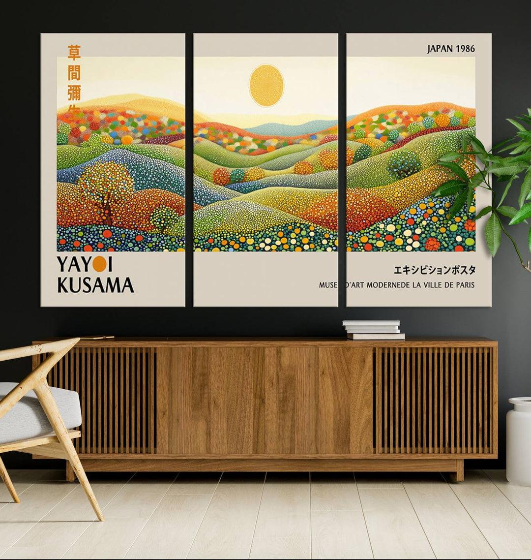 The Yayoi Kusama Wabi Sabi Japanese Wall Art Print features a vibrant landscape with dots, sun, and mountains.