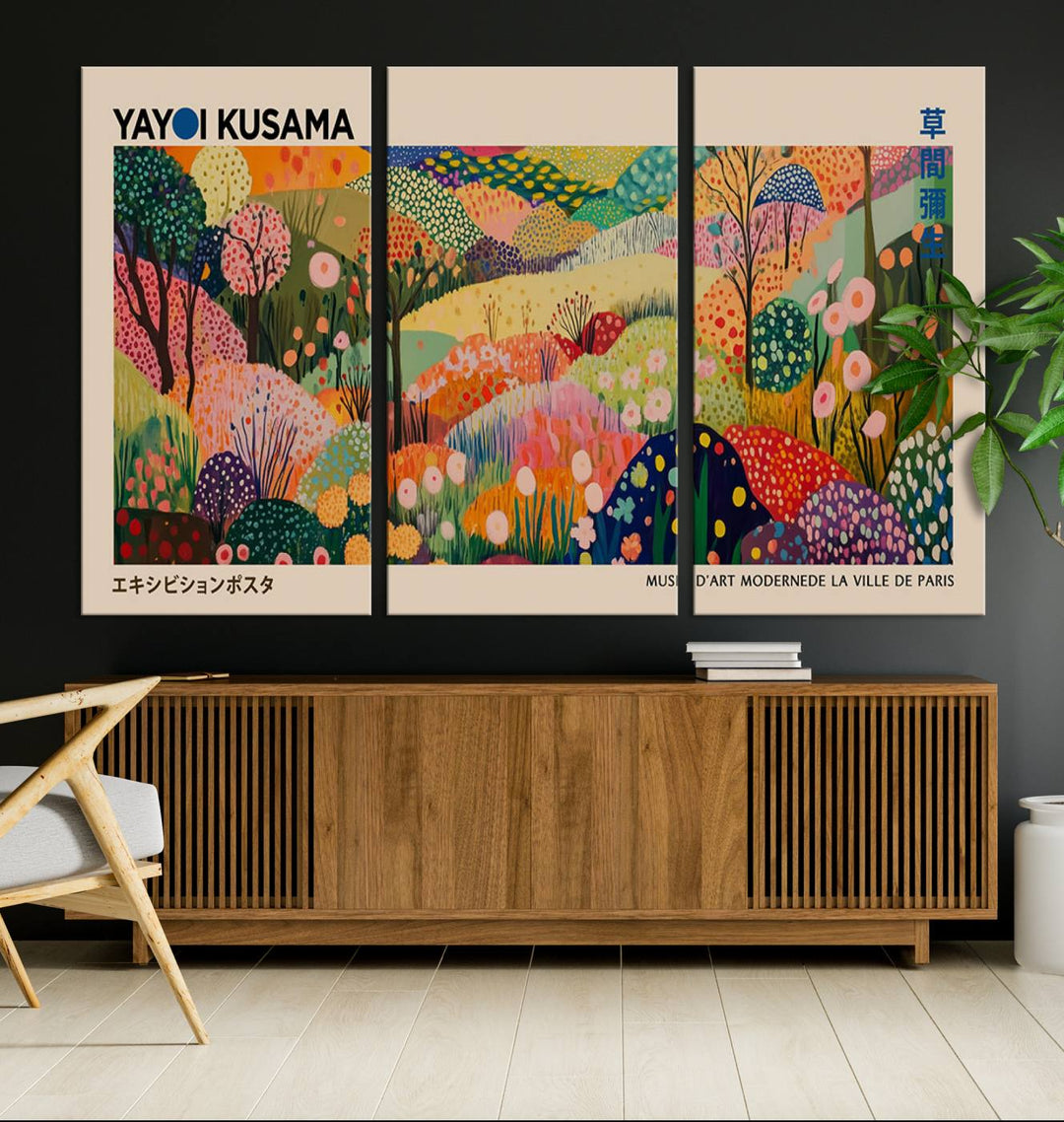 A Yayoi Kusama Wall Art Canvas Print featuring vibrant abstract floral patterns is displayed in a tranquil forest setting.