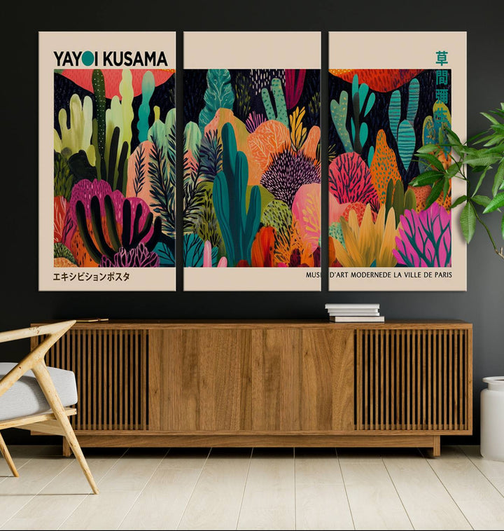 The vibrant canvas print of wall art features abstract plants, with the elegant text "Yayoi Kusama Wall Art Canvas Print" displayed on the colorful frame.