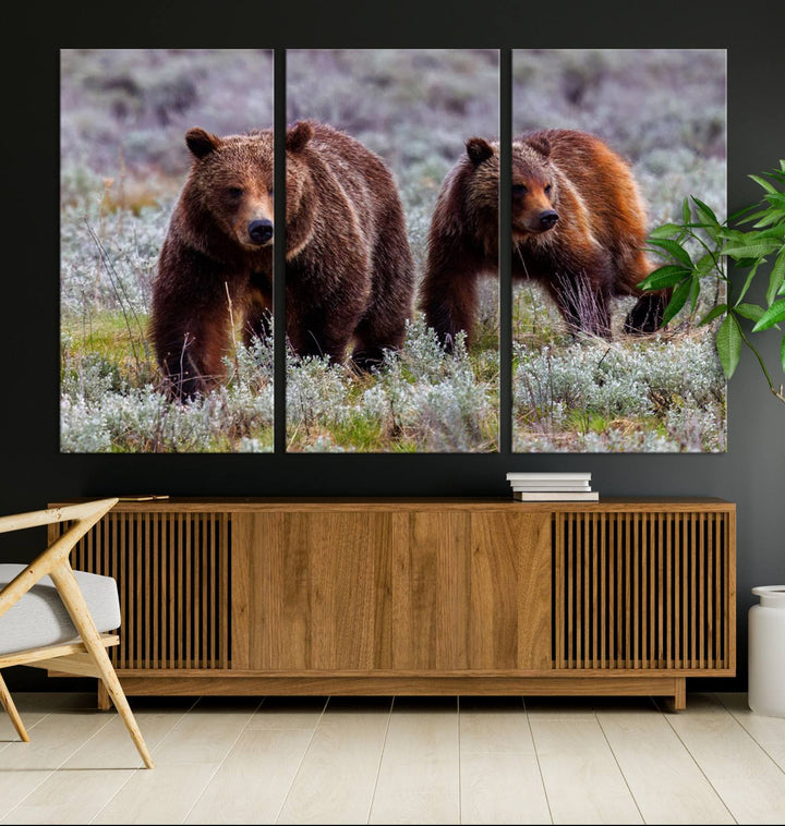 The "Grizzly 399 in Wild Flowers" wall art canvas print, showcasing grizzly bears amidst vibrant wildflowers, elegantly captures the enchanting essence of nature. This handmade piece from the USA brings striking beauty to any space.