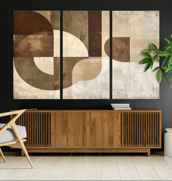 A Wabi Sabi Geometric Minimalist Wall Art Canvas Print—with a modern abstract geometric design in brown and beige tones—stands proudly in front of a house.