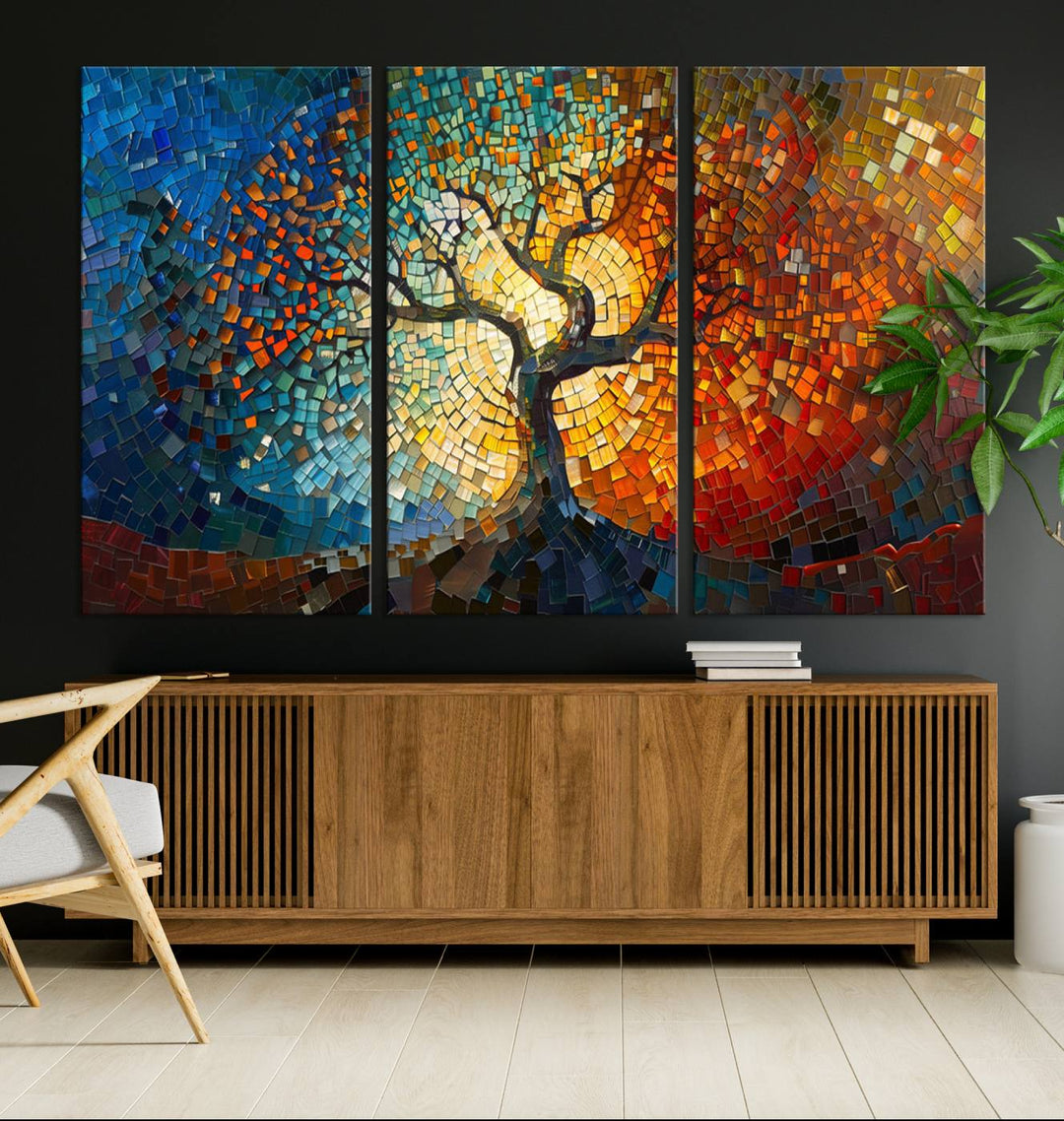 Mosaic Tree Canvas Wall Art: A stunning stained glass-inspired Tree of Life featuring blue and orange swirling patterns reminiscent of a sunburst.