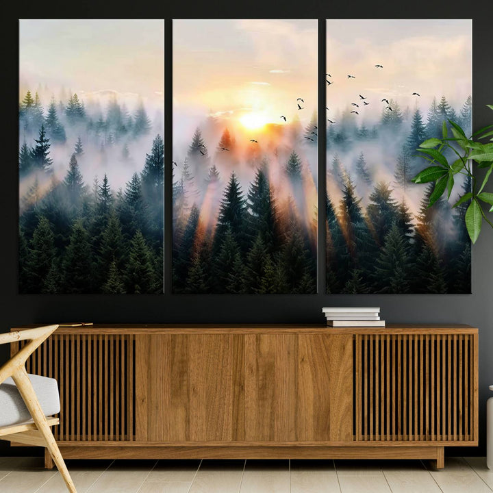 Sunrise over a misty forest with rays filtering through trees in the Abstract Forest Wall Art featuring soaring birds.