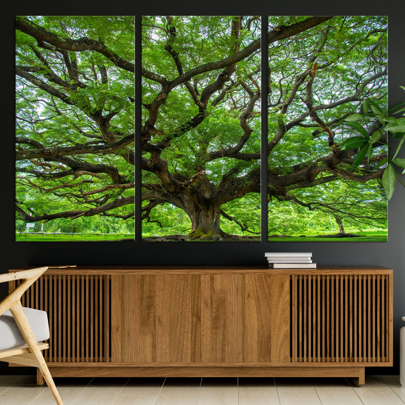 Canvas of an ancient tree with sprawling branches and vibrant green foliage, perfect for earthy, nature-inspired home decor.